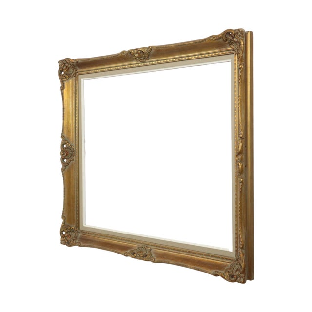 Large gold-colored vintage pine frame with a very beautiful aged patina, entirely in classic Baroque style, decorated with...