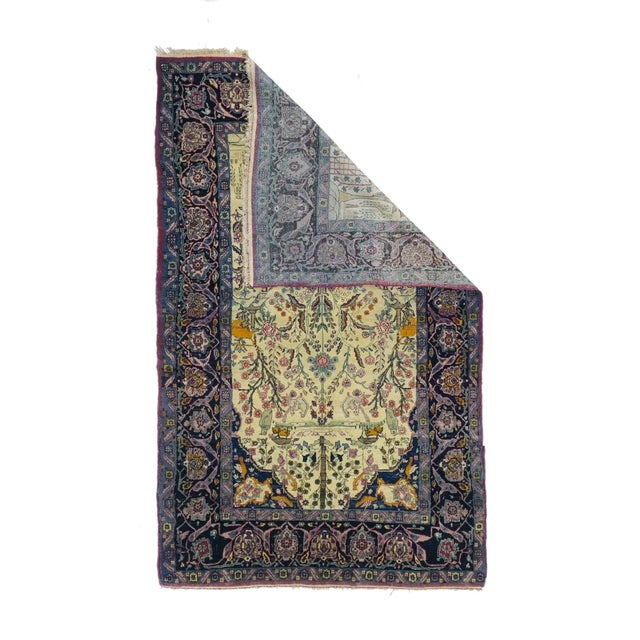 One of a relatively small urban Tehran interwar production, this finely woven niche layout scatter shows a basal central...