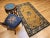 Graceful and timeless, this vintage Chinese Art Deco rug from the early 1900s showcases a serene tan wool field...