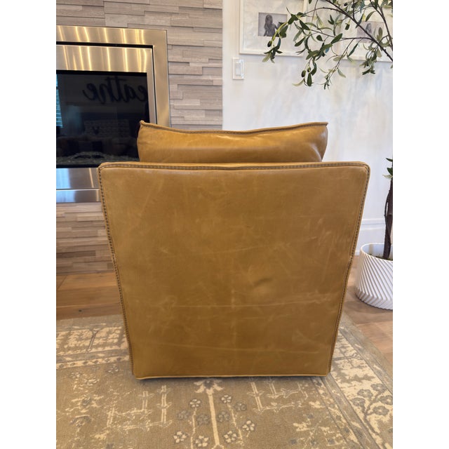 Two camel colored leather swivel chairs from Room & Board, 3 years old. Buttery soft leather with natural color variations.