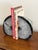 A pair of natural agate geode bookends with icy white crystal faces, gray green centers, and dark charcoal rims.