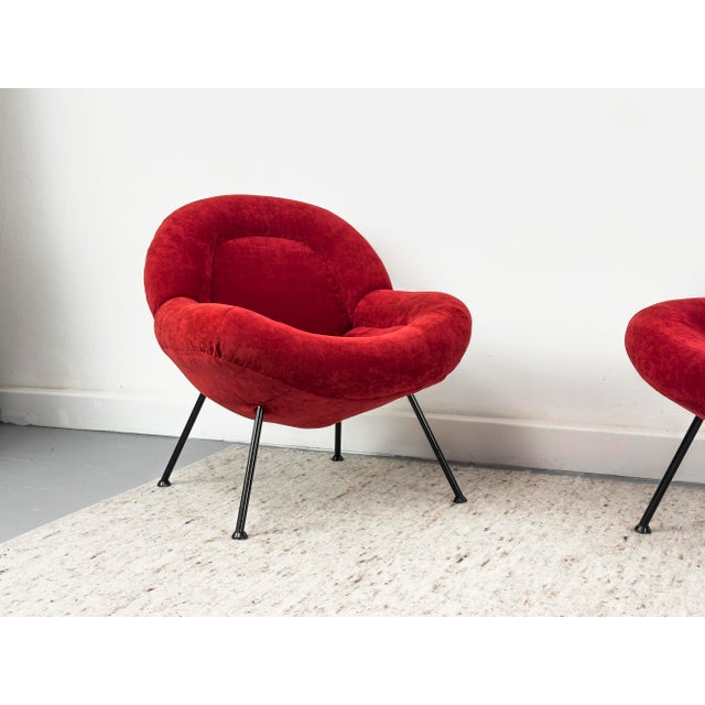 A finely proportioned pair of cocktail chairs from the German post-war modernist period, designed by Fritz Neth and...