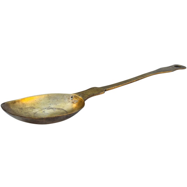 Antique Moroccan hand-crafted brass spoon meticulously handcrafted in an ornate playful and contemporary silhouette. With...