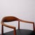 This beautiful chair with a Mid-Century Modern Scandinavian design features a curved solid wood backrest that seamlessly...