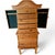 A beautifully crafted Fontana jewelry armoire with a warm honey wood finish and refined traditional detailing. The piece...