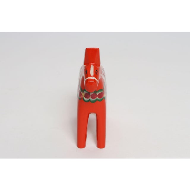 Mid-Century Scandinavian Modern Hand-Painted Dala Horse designed by Nils Olsson and handmade in a workshop in Färnäs...