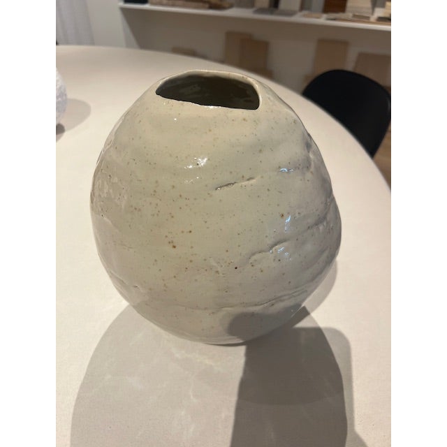 Dimensions: 8”w x 10”h Material: stoneware Finishing: glazed Color: beige Edition: one-of-a-kind