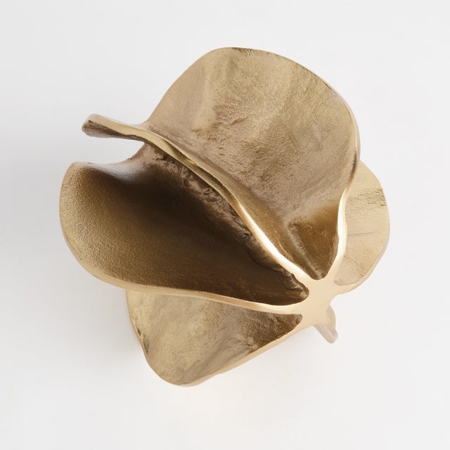 With a cast aluminum sculpting method, this natureinspired organic sculpture is a unique accent. A simple, yet...