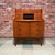 Vintage 1960s mid-century Danish modern teak secretary desk or bureau manufactured in Denmark. Features a slide-out desk...