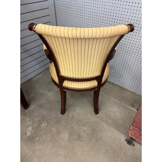 Louis XVI Style Armchair in a Neutral Pinstripe Fabric . Mahogany Wood . Accents .