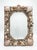 This vintage coastal wall mirror features an intricately encrusted frame that brings organic texture and nautical elegance...