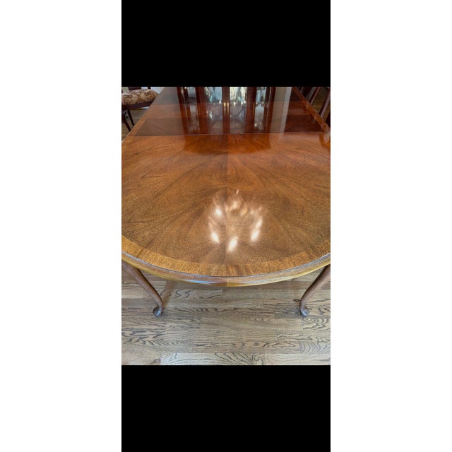 Thomasville Fine Mahogany Queen Anne Dining Table. Brand Tag is attached underneath the table) Measurement includes 2...