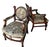 Rare Pair of Antique Medallion Back Parlor Armchairs – Ornate Carved Wood & Floral Tapestry • The Medallion Back: The...