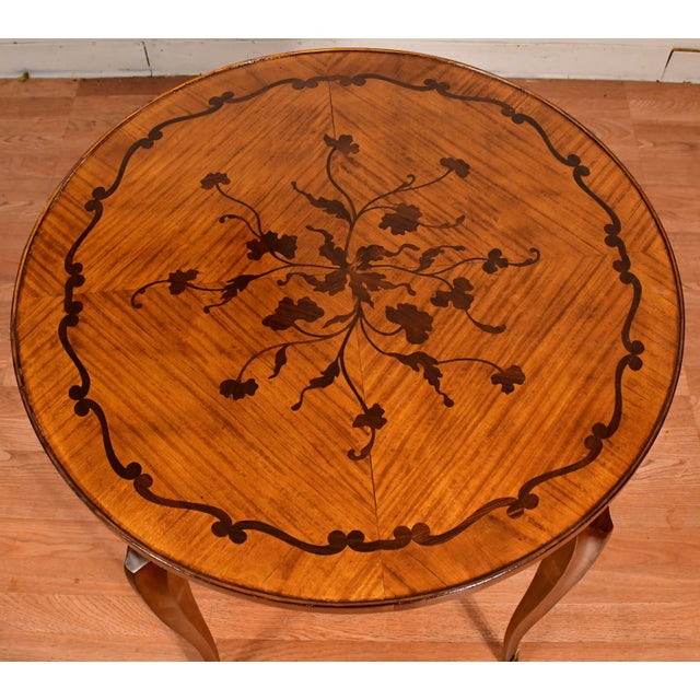 We are pleased to offer this beautiful French center table / side table, from the 1930s. This table is made of Satinwood,...