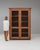 Here is a vitrine/cabinet, its natural pine, mesh wire door panels the first thing to catch the eye. Originating in France...
