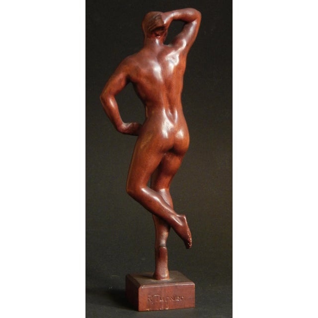 Beautifully sculpted from a ruddy block of mahogany and finished with a patina that gives it a lovely glow, this piece is...