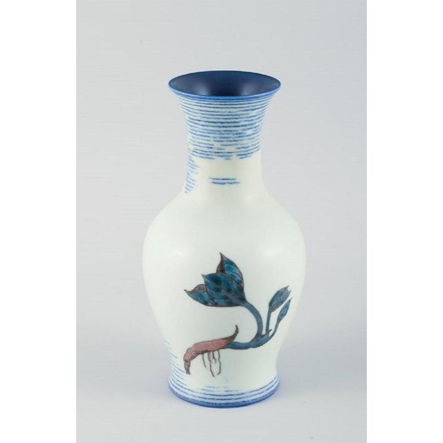 Jo Hahn Locher (1876-1960) for Bing & Grøndahl. Unique Art Deco vase decorated with branches and flowers. 1930s....