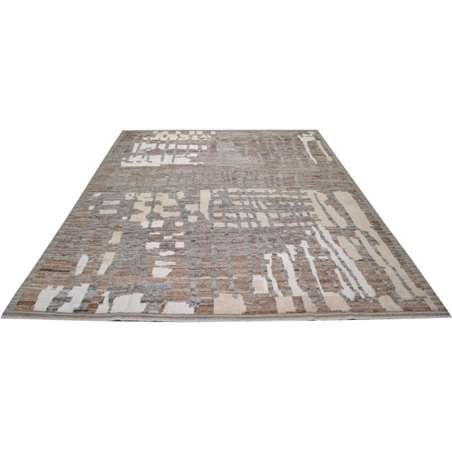 Moroccan Hand-knotted with care using traditional rug-making techniques, this wool rug blends timeless craftsmanship with...