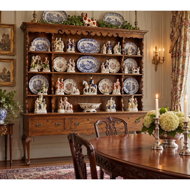 A handsome mid-20th century oak Welsh dresser, designed in the traditional Georgian English country manner. The...