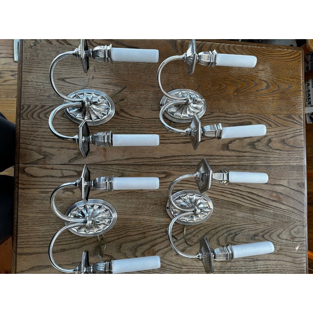 Old Lights On is pleased to offer this rare set of four silver plated two light Caldwell wall sconces. They are fully...