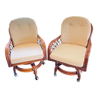 Rattan Grand Isle Swivel Tilt Caster Arm Chairs - Set of 2 For Sale