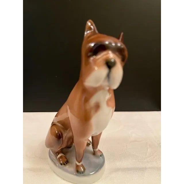 Vintage hand painted porcelain Boxer dog figurine.