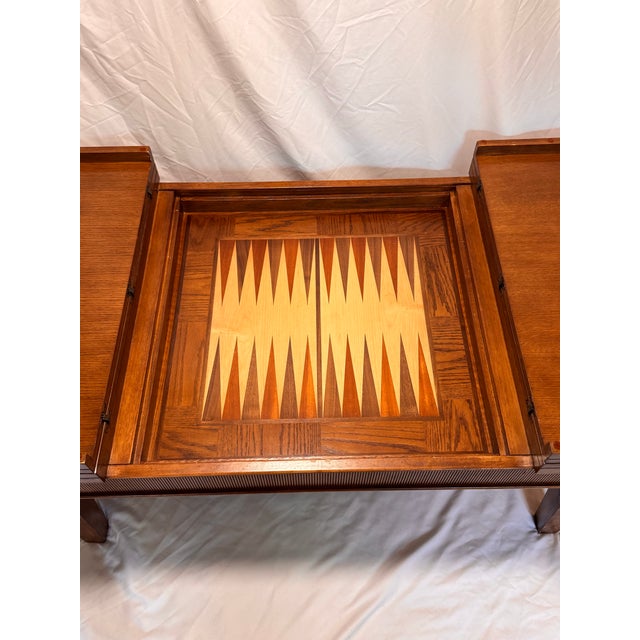 A handsome dual-purpose coffee table that opens to reveal a beautifully inlaid backgammon board. The hinged twin top...
