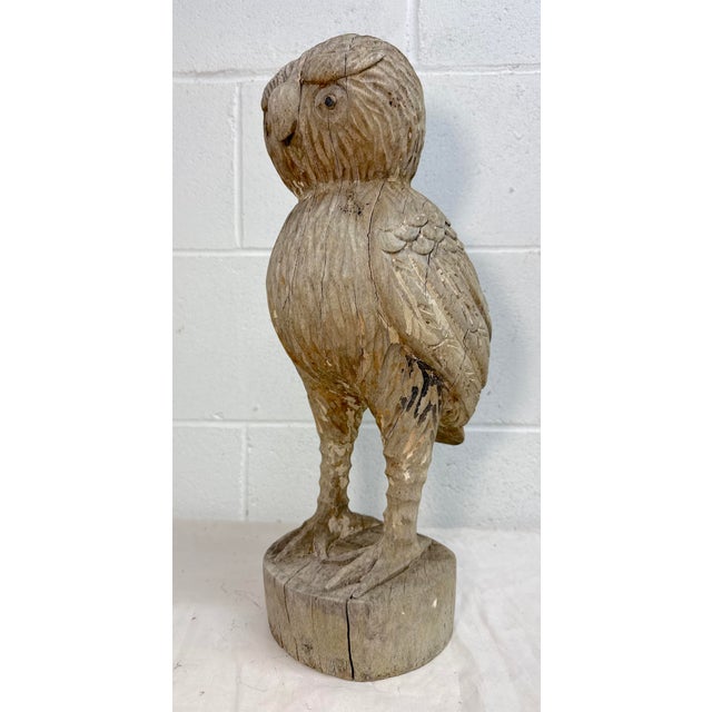 This large antique hand-carved solid wooden Folk Art owl sculpture is a unique and charming decorative statue. The...