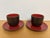 2 Sets of Heath Ceramics Small Cups and Saucers Glossy Red and Chocolate Brown glazes. Dimensions: Cups: 2-1/2" high,...