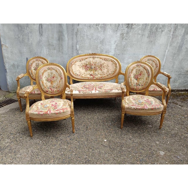 Dimensions of an armchair: Height 94 cm, width 63 cm, depth 58 cm. Fabric wear, tears.