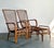 These striking vintage lounge chairs are a masterful celebration of 1970s Bohemian and Coastal design. Featuring a...