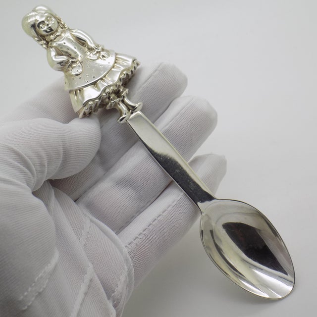 This lovely vintage spoon depicts a little girl, handcrafted in Italy during the 1970s/1980s. Made from genuine Sterling...
