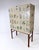 1950’s Swedish tall cabinet later papered with illustrations by C.A. Lindman book Nordens Flora. Cabinet consists of three...