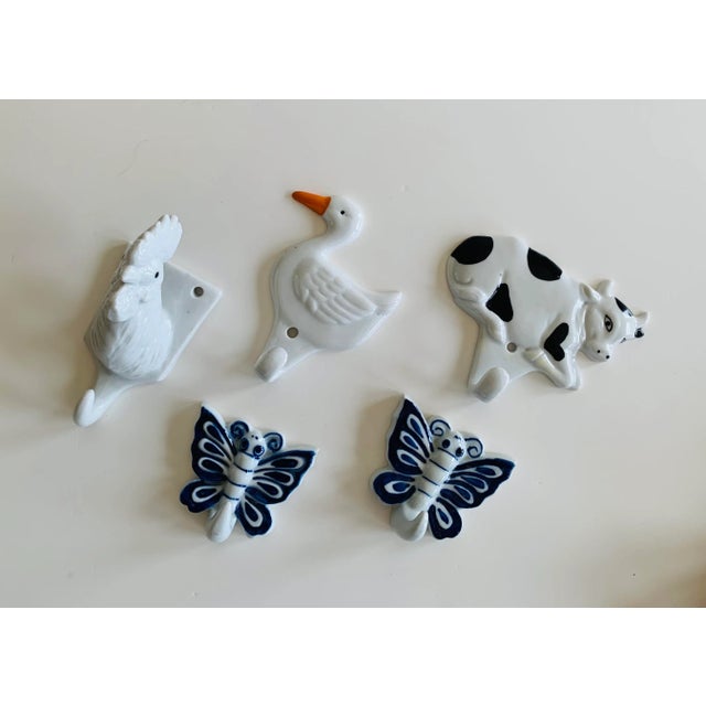 Fun and whimsical these wall hooks will bring smiles to all who gaze upon them. They are vintage and in perfect vintage...