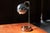 This space age ‘eyeball’ desk lamp was designed and produced in Italy during the 1970’s. The design is very reminiscent of...