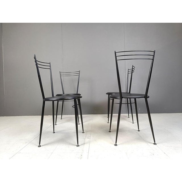 Vintage black metal dining chairs by Calligaris wit black leatherette dining chairs. 1980s - Italy Very good condition...