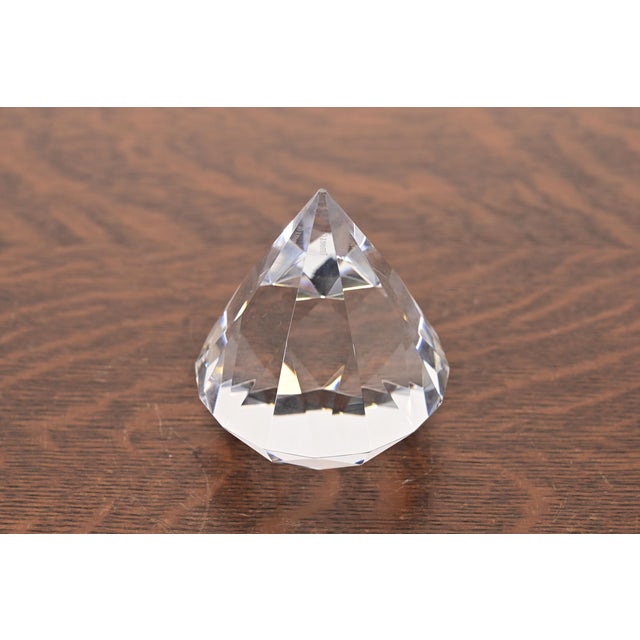A gorgeous crystal glass diamond faceted paper weight By Tiffany and Co. USA, Late 20th Century Measures: 3"W x 3"D x...