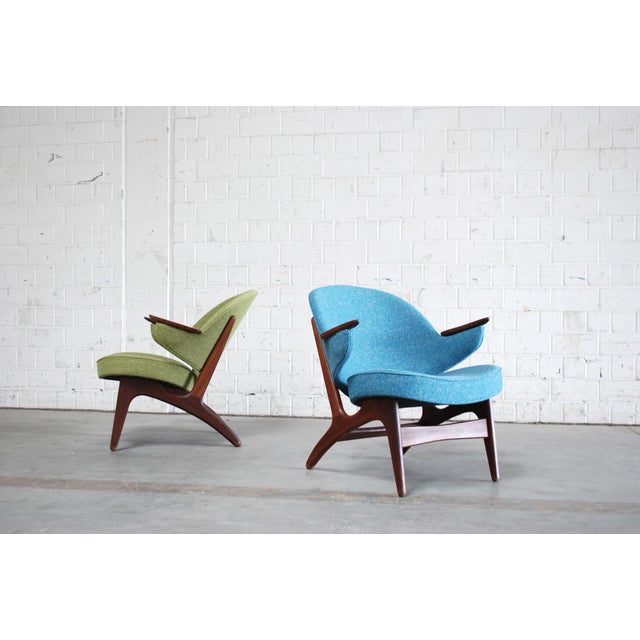 A Pair of Easy Chairs in petrol and green design by Carl Edward Matthes in teak wood. The Chairs are completely restored...