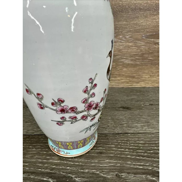 Vintage Chinese Porcelain Famille Peacock Vase Add timeless beauty to your décor with this Vintage Chinese Famille Peacock...