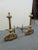 A pair of Regency style Andirons , made of solid cast brass , scrolls design base with bun feet , urn & column form with...