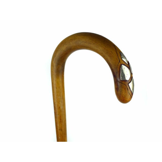 Early 20th Century Antique Hand-Carved Hardwood Gentleman Walking Cane With Inlaid Silver Motifs For Sale - Image 5 of 6