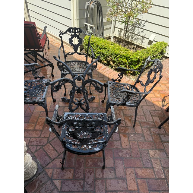 Molla cast Aluminum table base and 4 arm chairs in original condition Table Base is 31.5" width and 31.5" Depth and 28" in...