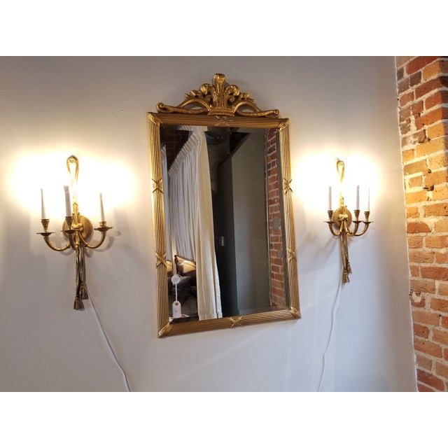 French Style cast brass 3 arm ribbon sconces from the hallways of the Towers Suites of the famed Waldorf Astoria hotel in...