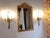 French Style cast brass 3 arm ribbon sconces from the hallways of the Towers Suites of the famed Waldorf Astoria hotel in...