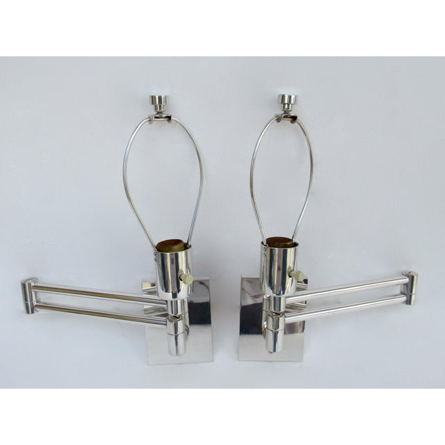 Vintage; C.1970's Original Georg W. Hanson, for Hanson Lighting Co., is this sophisticated, chrome plated over steel, pair...