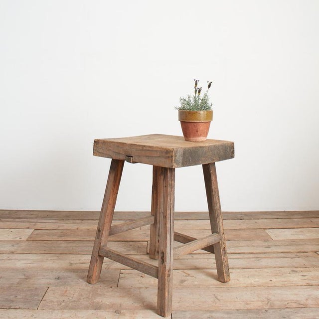 A beautiful solid wooden elm table with some lovely original patina. The thick weathered table top has plenty of rustic...