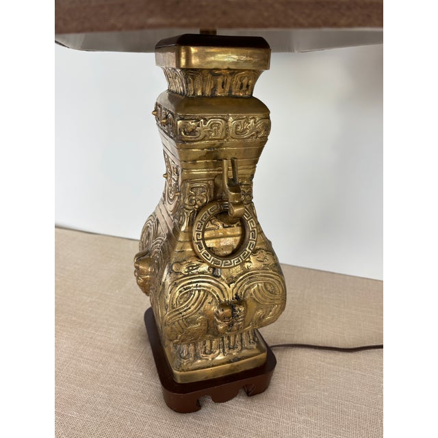Wood Vintage Pair Asian Archaic Brass Urn Lamps James Mont Style With Linen Shades For Sale - Image 7 of 15