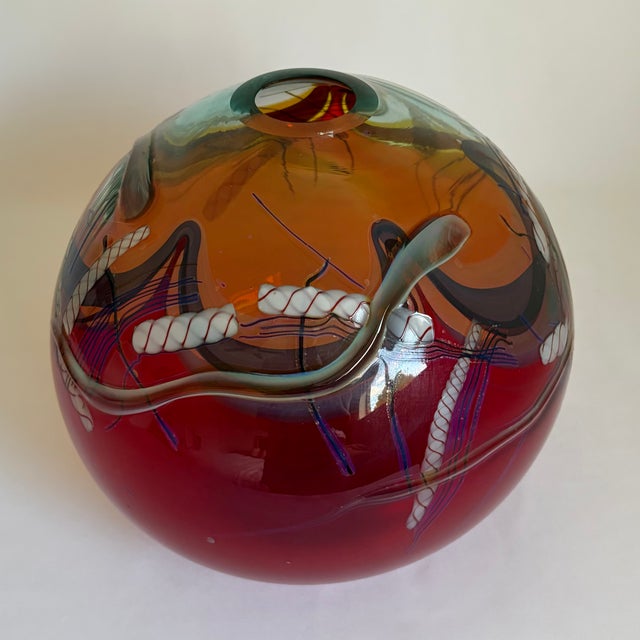 A large signed studio art glass vase by American glass artist Daniel Edler, created in 1990 as part of his Graffiti Helix...