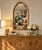 Elegant vintage Hollywood Regency wall mirror by Baker Furniture, featuring a beautifully sculpted architectural arched...