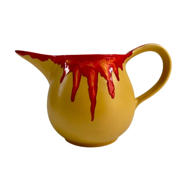 Vintage Mid-Century Modern Holt Howard HH Italy Ceramic Pottery Pitcher with a distinctive red lava or flame detail. The...